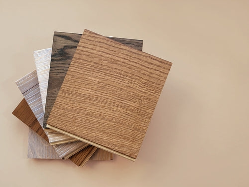 What is the difference between engineered wood and laminate flooring?